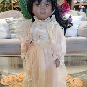 Elegant Pink Porcelain Doll
